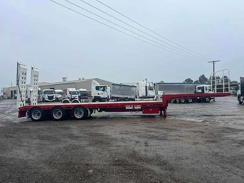 2022 Howard Porter Tri Axle Drop Deck with Ramps and Ringfeder - Image 2