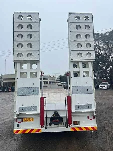 2022 Howard Porter Tri Axle Drop Deck with Ramps and Ringfeder - Image 5